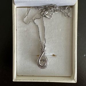 SWAROVSKI necklace with “dancing” pendant